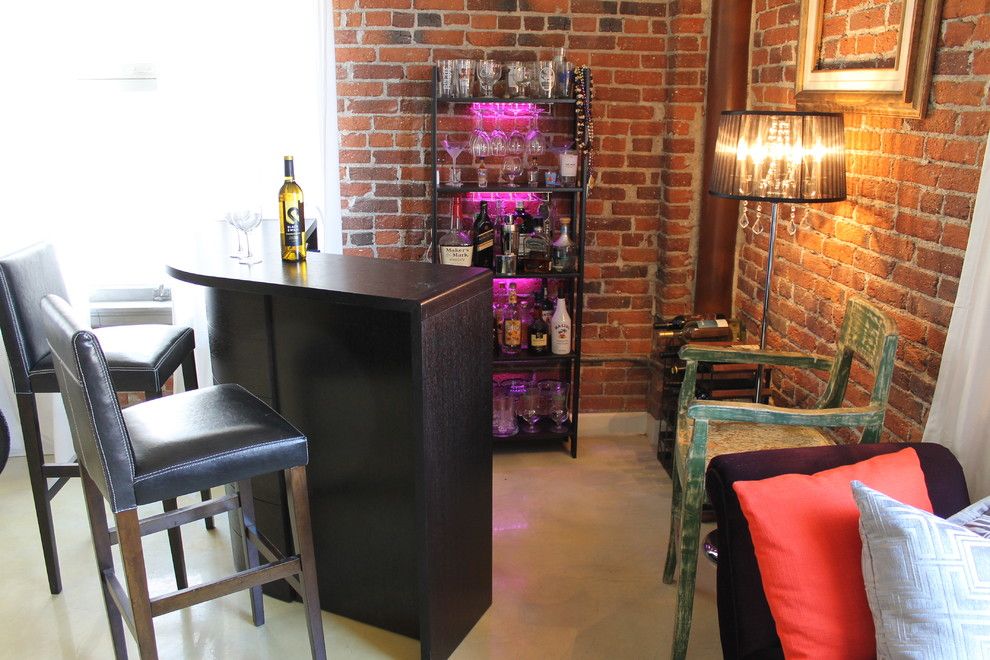 Plummers Furniture for a Eclectic Living Room with a Eclectic and Eclectic Boudoir Inspired Bar by Madison Modern Home