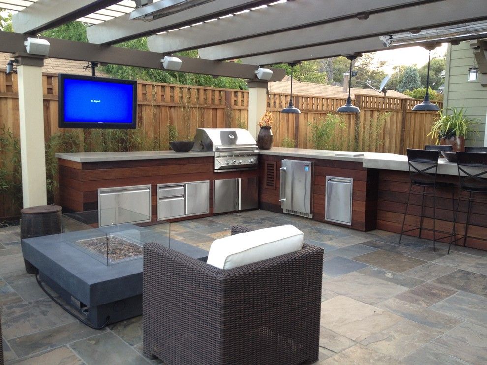 Polished Concrete Countertops for a Contemporary Patio with a Concrete Fire Pit and Los Gatos Man Cave by Divine Nature Landscape Design