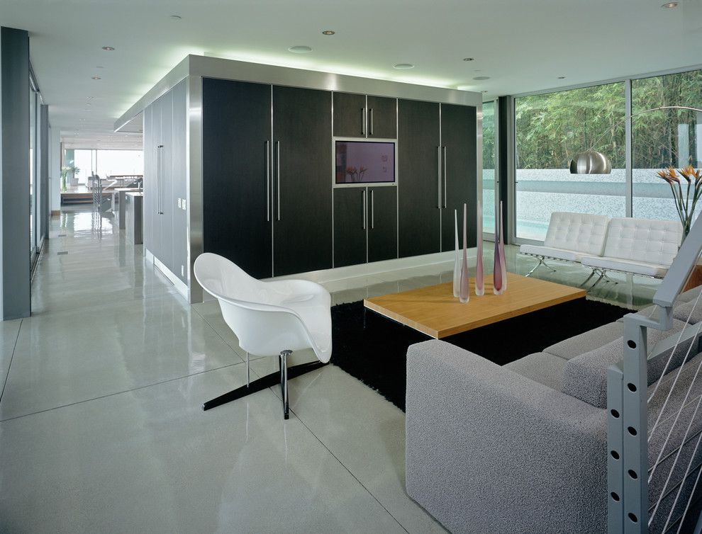 Polished Concrete Countertops for a Modern Family Room with a Cove Lighting and Dafna Zilafro by Studio Pali Fekete Architects [Spf:a]