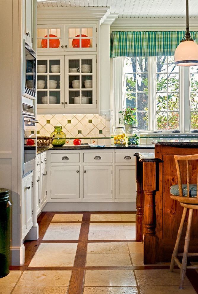 Porcelain vs Ceramic Tile for a Traditional Kitchen with a Kitchen Hardware and Crisp Architects by Crisp Architects