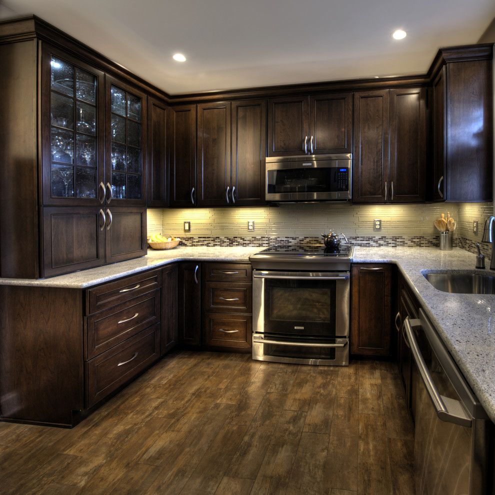 Porcelain vs Ceramic Tile for a Traditional Kitchen with a Transitional and Dc Row Home Kitchen   Range by Synergy Design & Construction