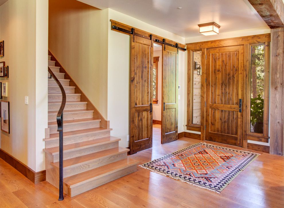 Porter Barn Wood for a Rustic Entry with a Area Rug and Gozzer Lot 224 by Mckinney Group, Inc