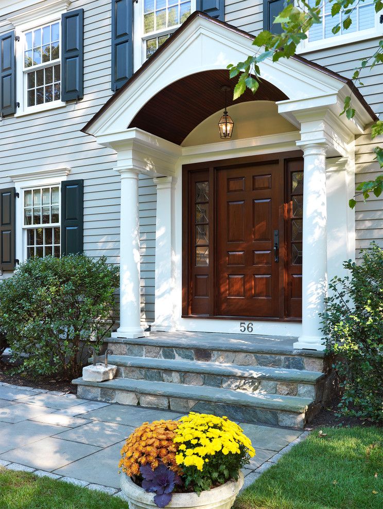 Portico Designs for a Traditional Entry with a Stoop and Colonial Touch by Jan Gleysteen Architects, Inc