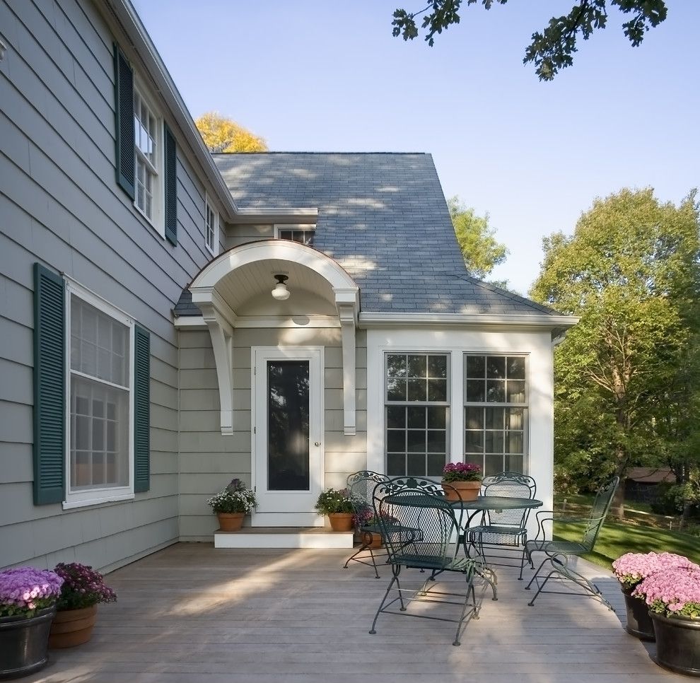 Portico Designs for a Traditional Exterior with a Curved Awning and 1940's Colonial Revival Remodel   Exterior by Trehus Architects+Interior Designers+Builders