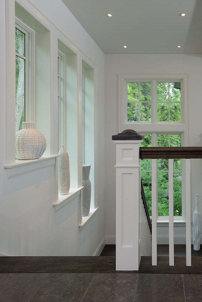 Poshtots for a Contemporary Staircase with a Wood Railing and Muskoka Cottage by Belinda Albo Design Studio