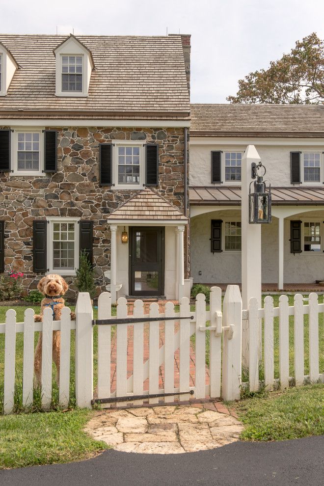 Poshtots for a Farmhouse Exterior with a Black Shutters and Bryn Coed Farm by Archer & Buchanan Architecture, Ltd.