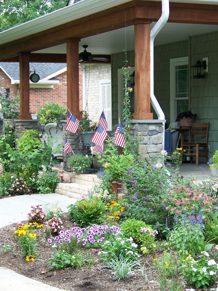 Poshtots for a Traditional Porch with a White Ceiling and Craftsman Exterior by Anna Looper