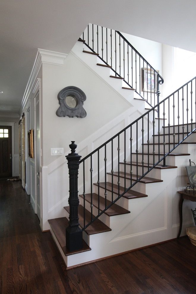 Poshtots for a Traditional Staircase with a Wrought Iron and Antque Newel Post by Cedar Hill Interiors, Llc