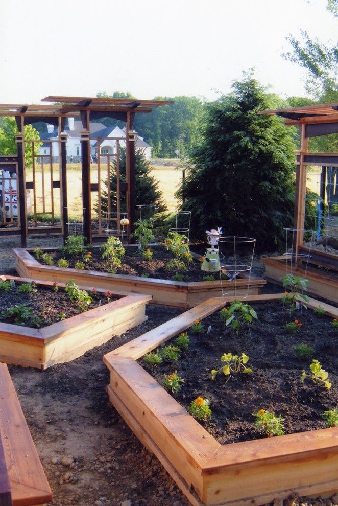 Potager Garden for a Craftsman Landscape with a Wood Trellis and Koslowski Residence by Pro Care Horticultural Services