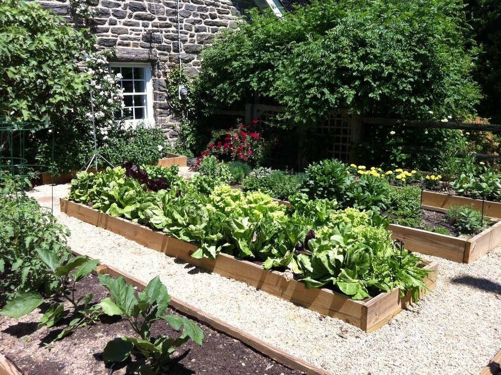 Potager Garden for a Traditional Landscape with a Stone Exterior and Vegetable Garden by Burke Brothers Landscape Design/build