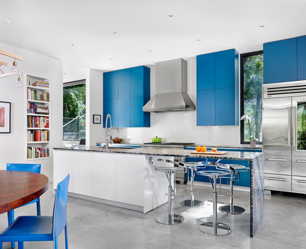 Precision Countertops for a Contemporary Kitchen with a Gray Floor and Stratford Creek Residence by Matt Garcia Design