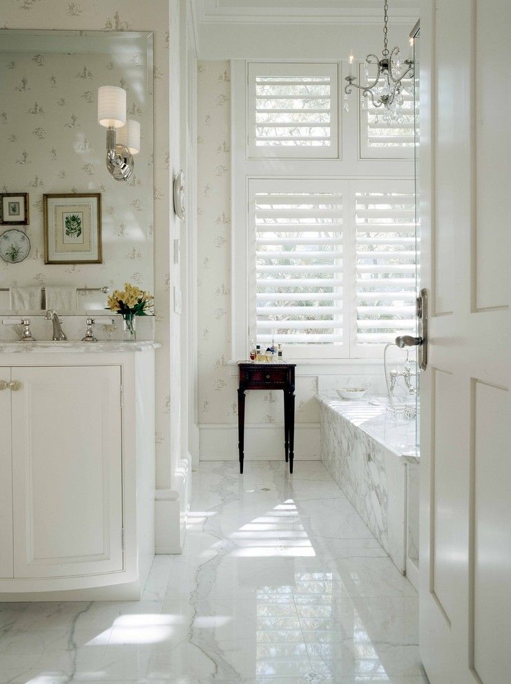 Preppy Wallpaper for a Traditional Bathroom with a Soaking Tub and Wetmore by Frederick + Frederick Architects