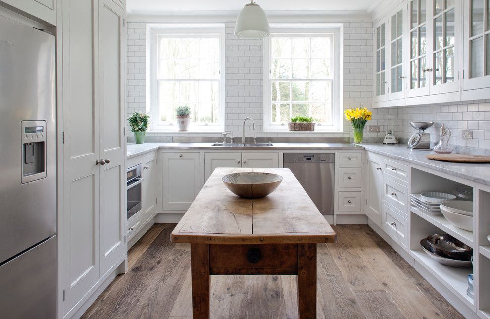 Pro Source Flooring for a Traditional Kitchen with a Wood Floor and the Pantry by Stephen Graver Ltd