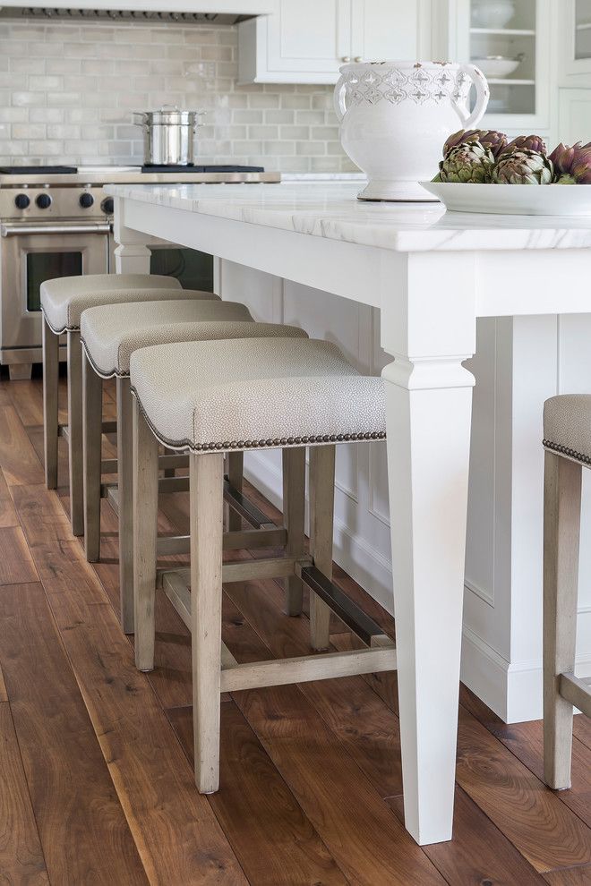 Prosource Flooring for a Traditional Kitchen with a Clean Lines and Lake Minnetonka Tailored White Kitchen by Liz Schupanitz Designs