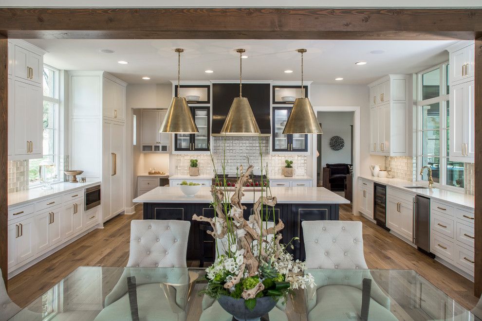 Prosource Flooring for a Transitional Kitchen with a Transom Windows and Luxury Home Magazine Parade of Homes by Kelle Contine Interior Design, Llc