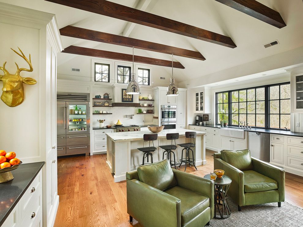 Quaker Windows for a Farmhouse Kitchen with a Fire Feature and Sycamore Farms by Sullivan Building & Design Group