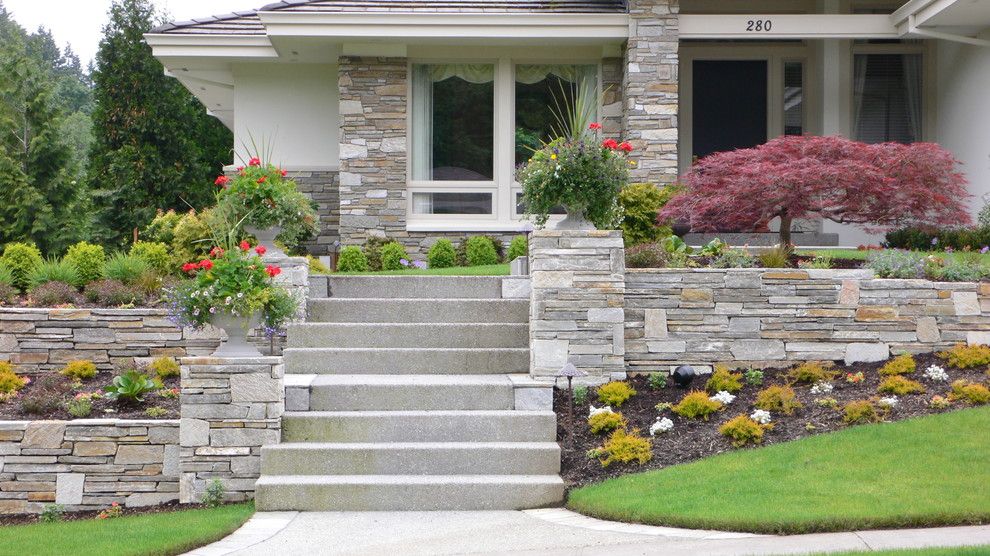 Quality Stone Veneer for a Contemporary Exterior with a Potted Plants and Cultured Stone Wall and Facing by Landscape East & West