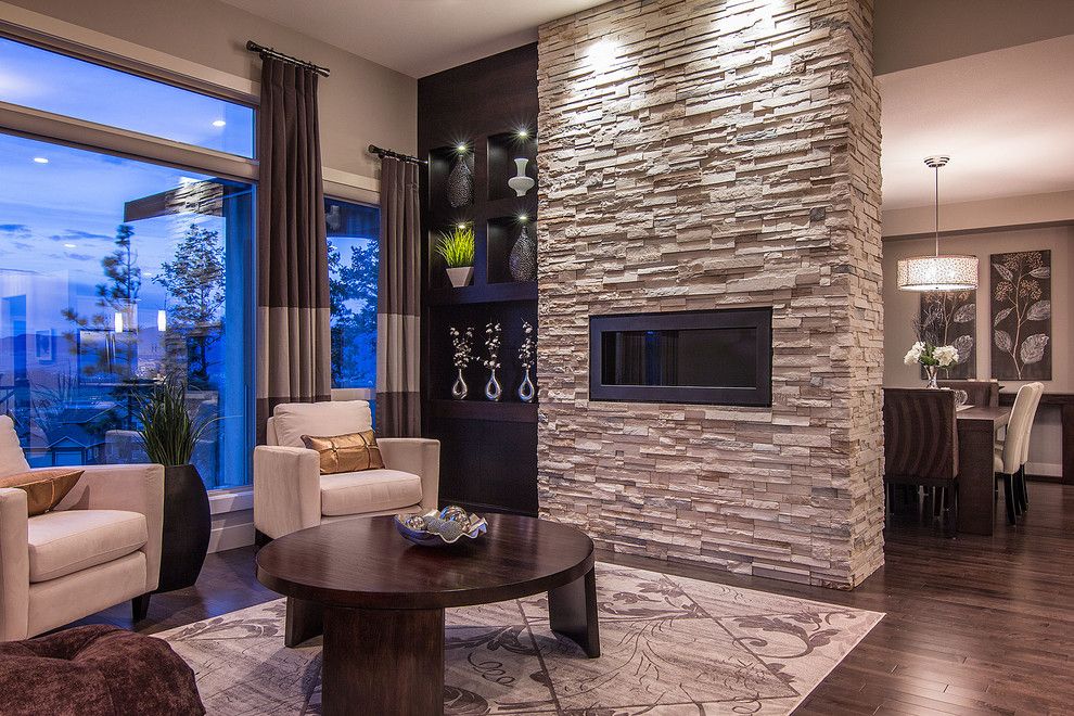 Quality Stone Veneer for a Contemporary Living Room with a White Arm Chairs and Summit at Selkirk by Dilworth Homes