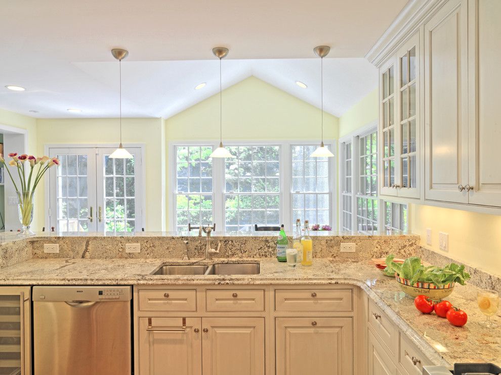 Quartz vs Granite Countertops for a Traditional Kitchen with a Slab Countertops and Case Design/remodeling, Inc. by Case Design/remodeling, Inc.