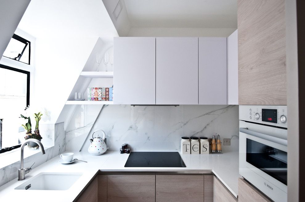 Queen City Appliance for a Contemporary Kitchen with a White Kitchen and City Studio Apartment by Black and Milk Residential