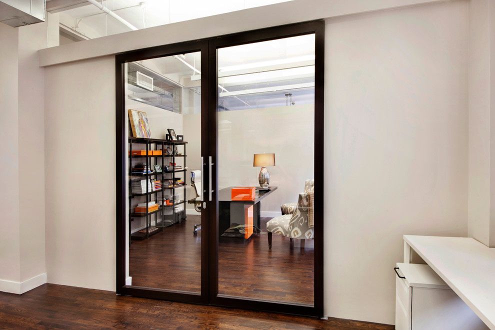 Raydoor for a  Spaces with a Sliding Barn Doors and Wimberly Interiors by Raydoor