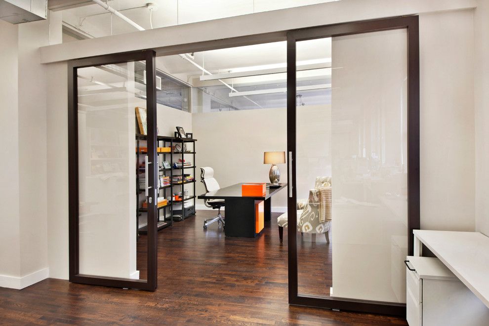 Raydoor for a  Spaces with a Sliding Barn Doors and Wimberly Interiors by Raydoor