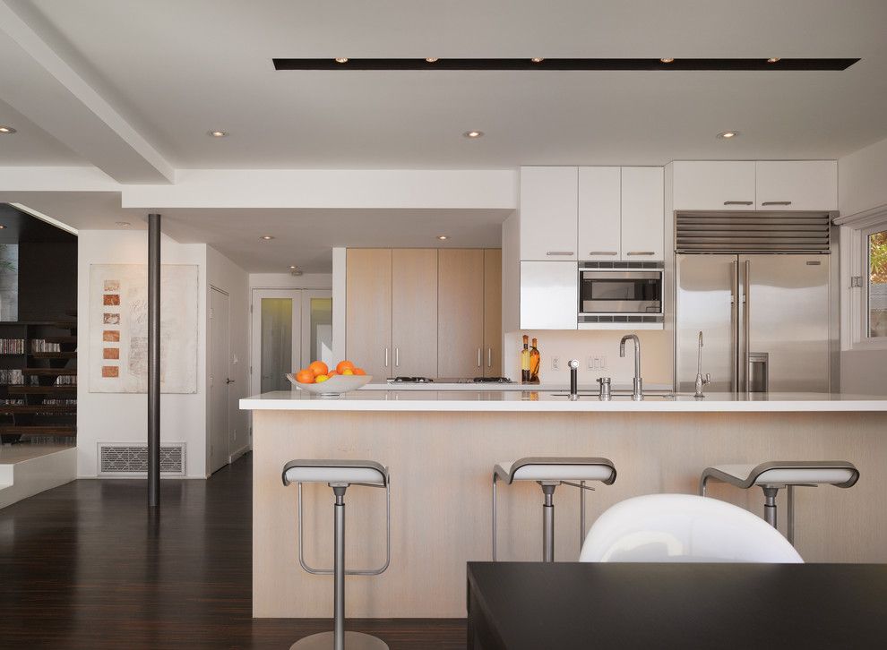 Recessed Lighting Layout for a Modern Kitchen with a Wood Cabinets and Griffin Enright Architects: Hollywood Hills Residence by Griffin Enright Architects