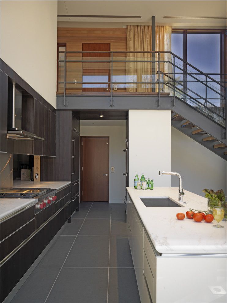 Rectified Tile for a Contemporary Kitchen with a Wood Paneling and Woodvalley House   Kitchen by Ziger/snead Architects