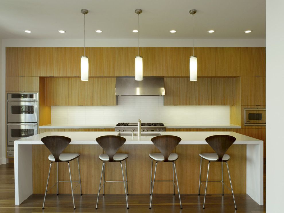 Rectified Tile for a Modern Kitchen with a Wood Floor and Spruce Street by Upscale Construction