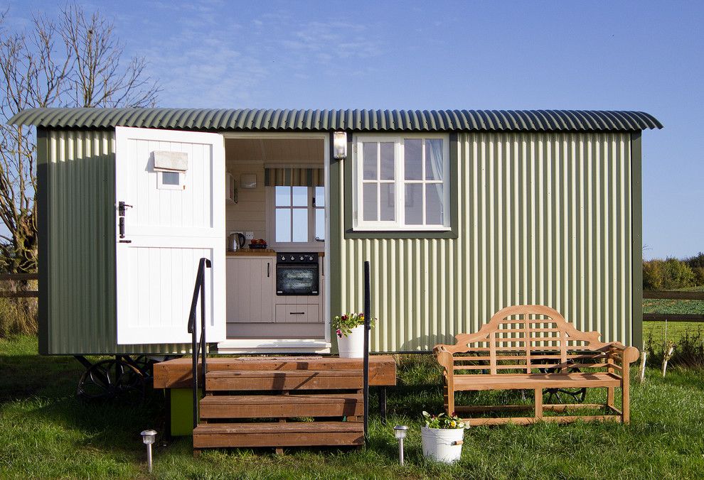 Reeds Ferry Sheds for a Farmhouse Shed with a Summer Houses and Self Contained Huts by Riverside Shepherd Huts Ltd