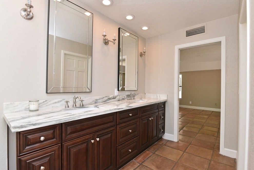 Reef Builders for a Traditional Spaces with a Vintage Bathroom Sconces and Poinsetta   Complete Remodel by Reef Builders Llc