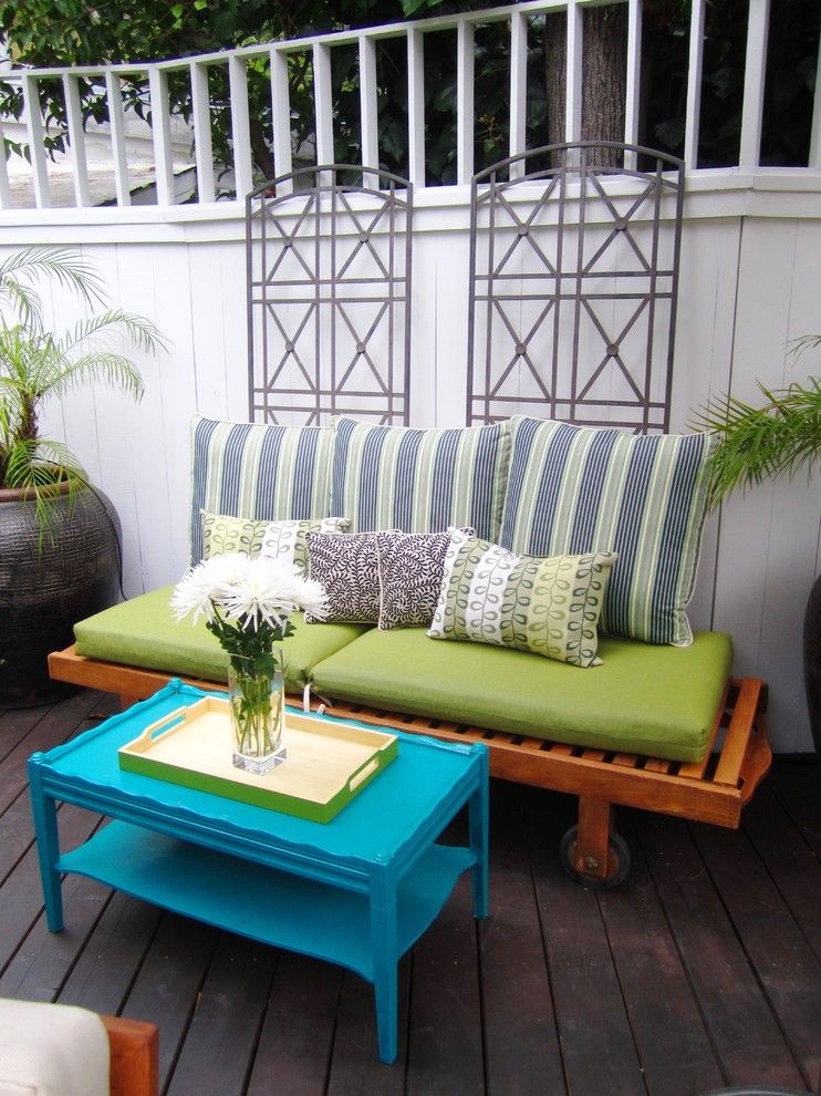 Refinished Furniture for a Eclectic Deck with a Potted Plants and Cococozy in the Hollywood Hills by Cococozy