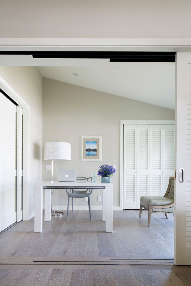 Repurposed Pallets for a Tropical Home Office with a Louvered Doors and Kailua Residence by Barker Kappelle Construction, Llc