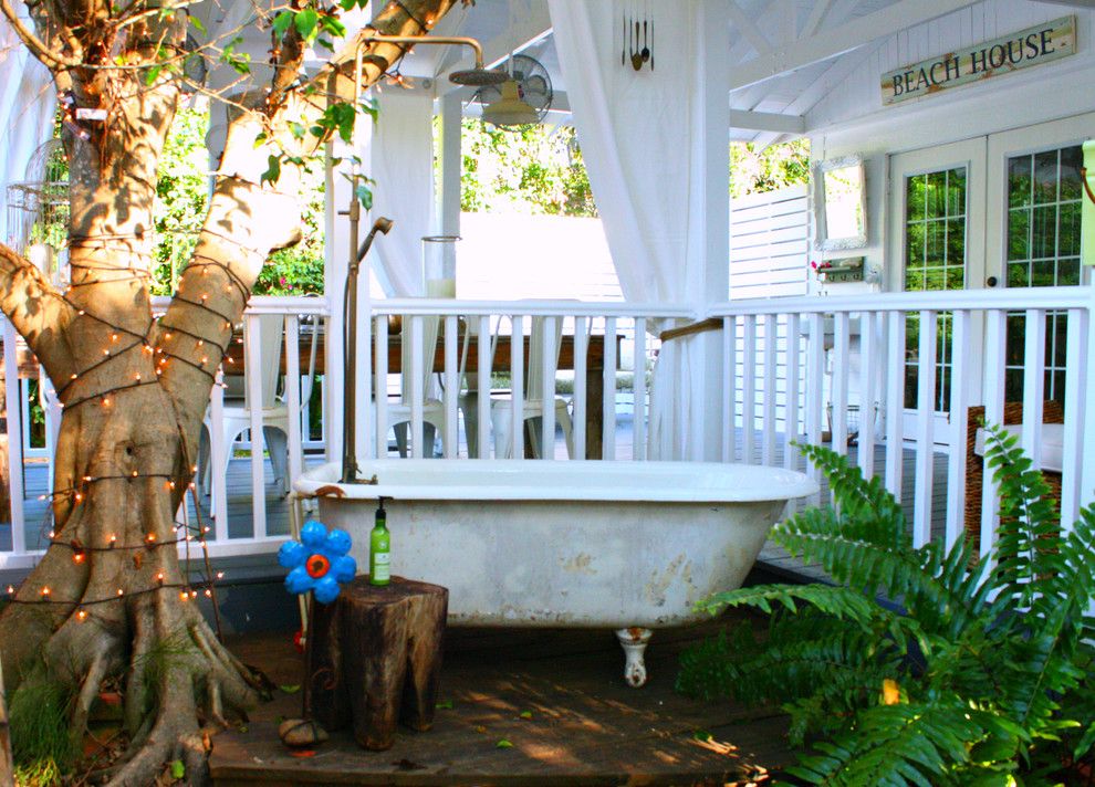 Reuse Hawaii for a Eclectic Deck with a String Lights and Carcary Residence by Mina Brinkey