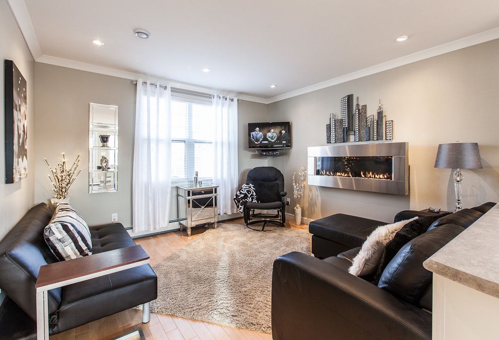 Revere Pewter for a Contemporary Living Room with a Black Leather Sofa and My Houzz: Open Concept Apartment Above Retail in Downtown St. John's by Becki Peckham