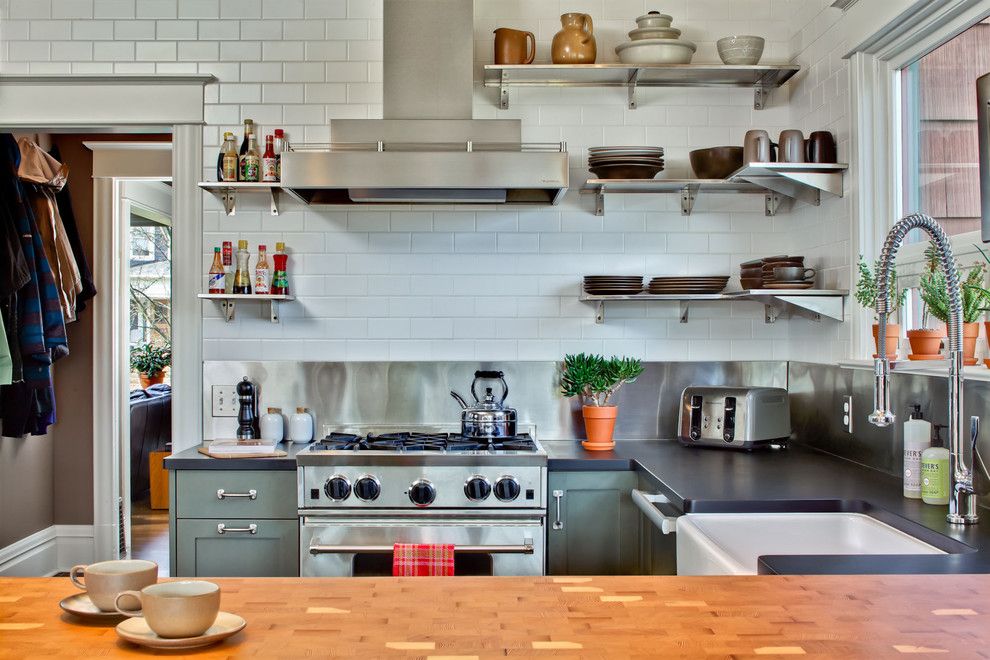 Richlite for a Transitional Kitchen with a Butcher Block Countertop and Capital Hill Kitchen by Gaspar's Construction