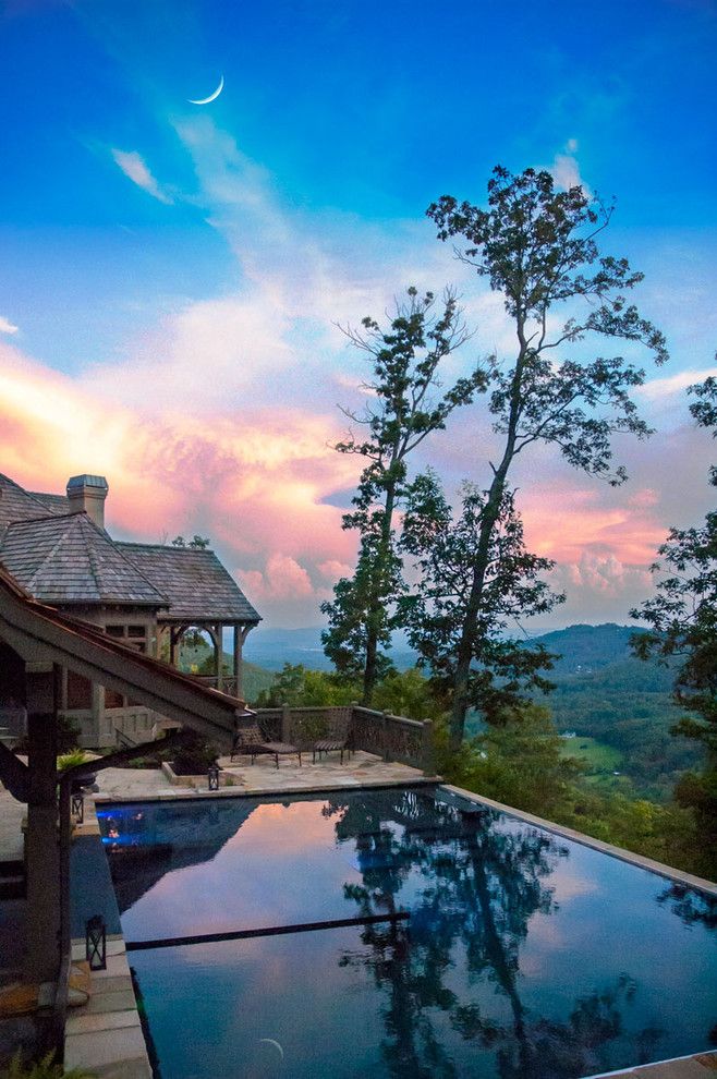 Rising Sun Pools for a Contemporary Pool with a View and Cloud Pool by Medallion Pool Co.