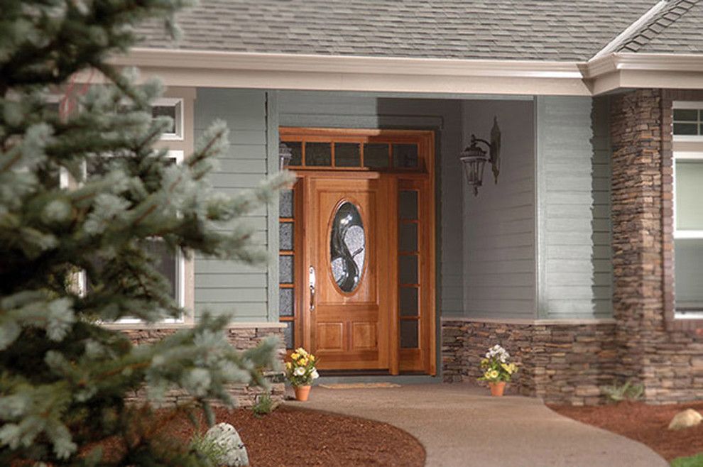 Rogue Valley Doors for a Craftsman Exterior with a Arched Entry and Doors by Rogue Valley Door