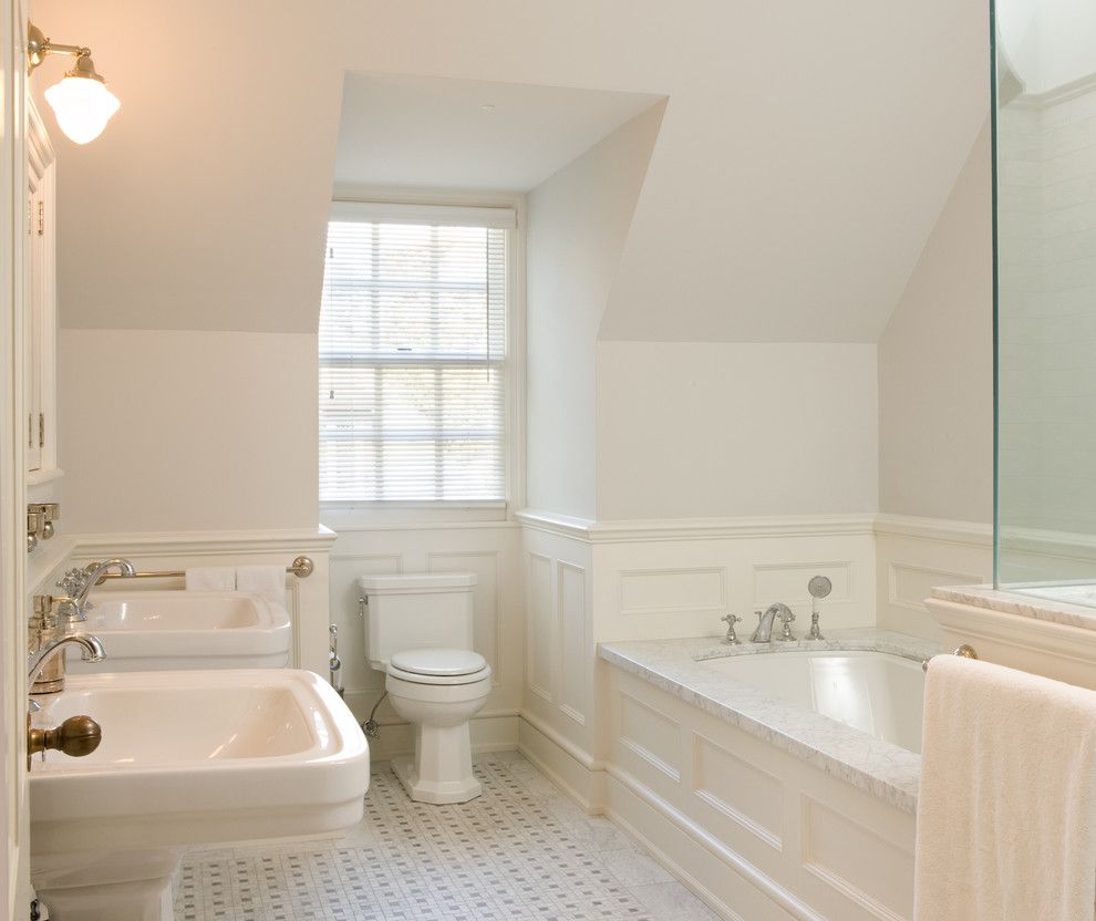 Roman Tub for a Traditional Bathroom with a Bathroom and Toronto Restoration by Heintzman Sanborn Architecture~Interior Design