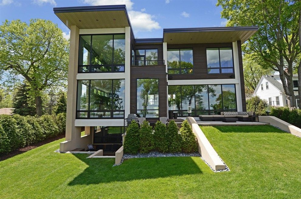 Roof Overhang for a Contemporary Exterior with a Flat Roof and Minnetonka Modern by Turnquist Design