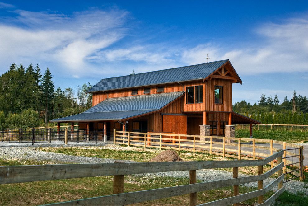 Roof Overhang for a Farmhouse Shed with a Horses and South Langley Stable by Site Lines Architecture Inc.