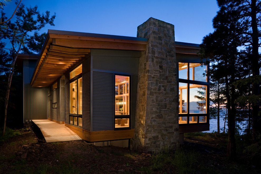 Roof Overhang for a Modern Exterior with a Rafters and Eagle Harbor Cabin by Finne Architects