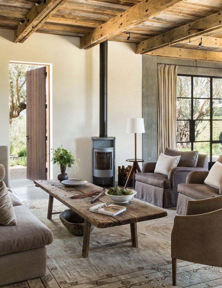 Rose Tarlow for a Farmhouse Living Room with a Beamed Ceiling and Healdsburg Ranch by Jute Interior Design