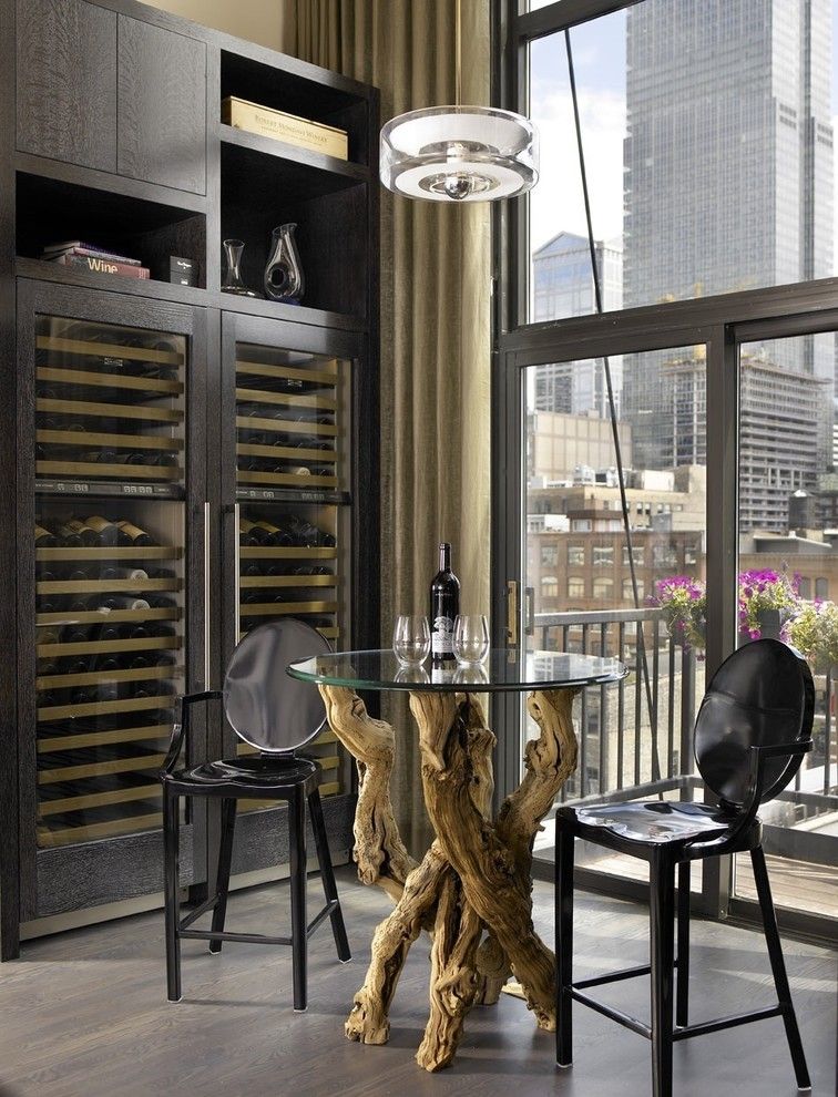 Rudy Furniture for a Industrial Wine Cellar with a Balcony and Jamesthomas, Llc by Jamesthomas Interiors