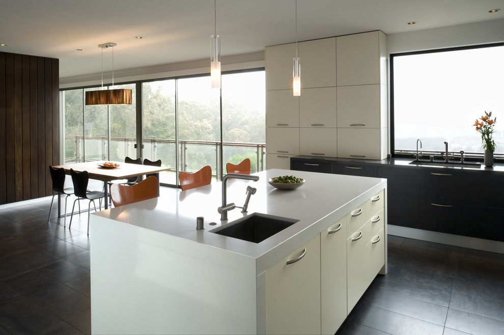 Rudy Furniture for a Modern Kitchen with a White Cabinets and Eberhart by John Lum Architecture, Inc. Aia