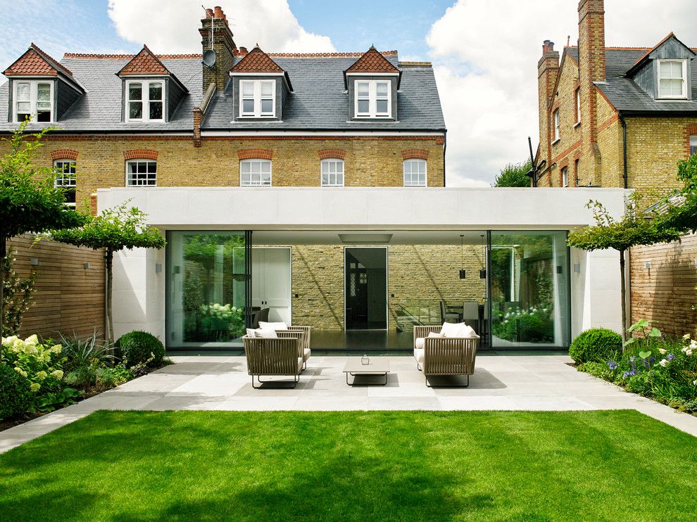 Ryan Lawn and Tree for a Contemporary Patio with a Fence and Wandsworth Contemporary Bespoke Grey Kitchen by Brayer Design