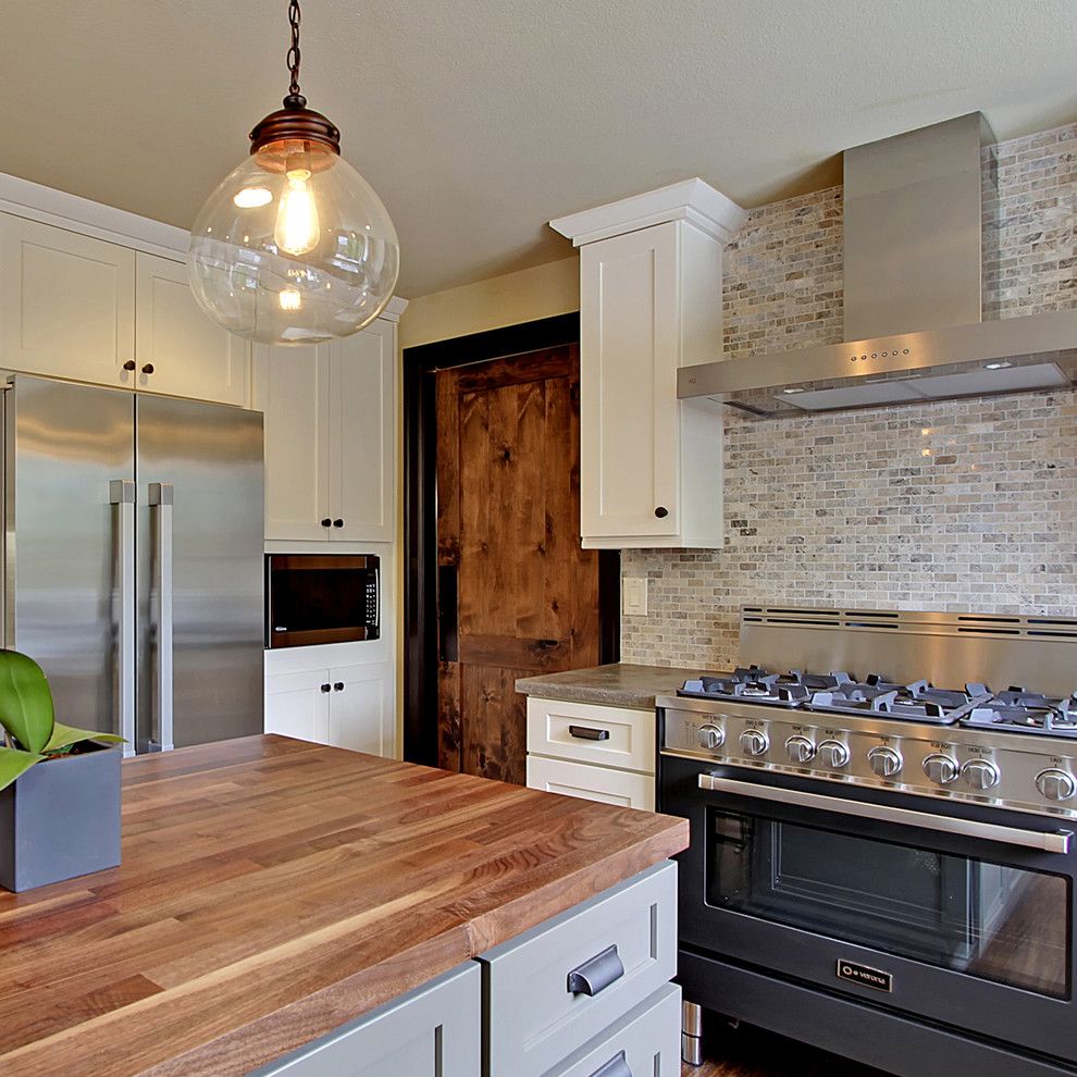 Santa Cecilia Light Granite for a Contemporary Kitchen with a Butcher Block Island and Verona Appliances by Verona Appliances