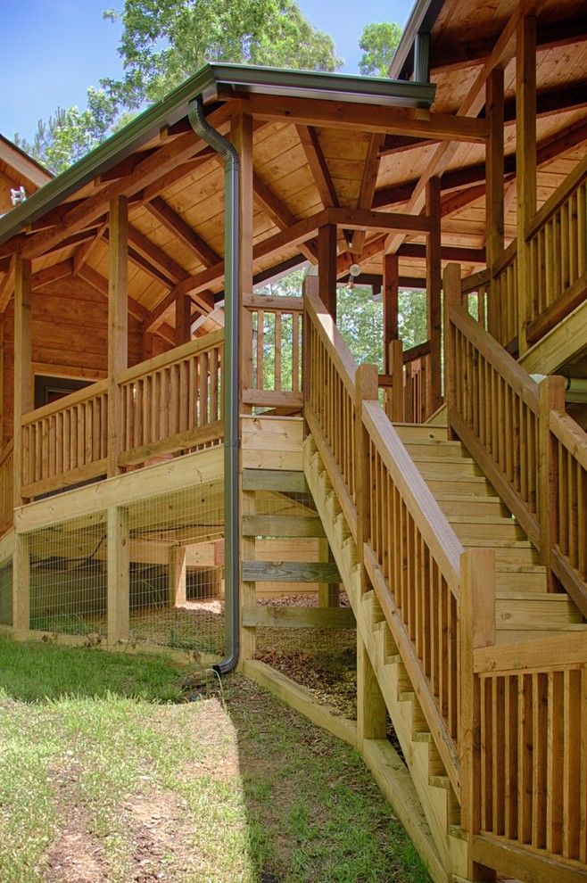 Satterwhite Log Homes for a Rustic Spaces with a Railing and Modified Misty Ridge   Ellijay, Ga by Satterwhite Log Homes