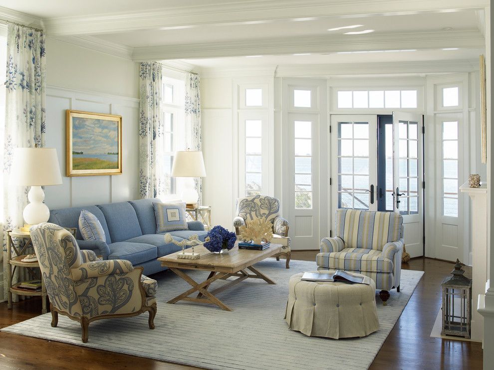 Schewels Furniture for a Beach Style Living Room with a Transom Window and Nautical House on the Bay   Hamptons by Austin Patterson Disston Architects