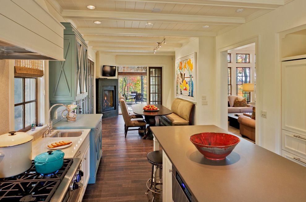 Schmitt Furniture for a Traditional Kitchen with a Oval Dining Table and Stone Golf Cottage by Platt Architecture, Pa